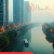 Aerial view of Neo‑Nerul’s luxury towers, corporate park, metro line, and water taxi—showcasing connectivity and upscale living.